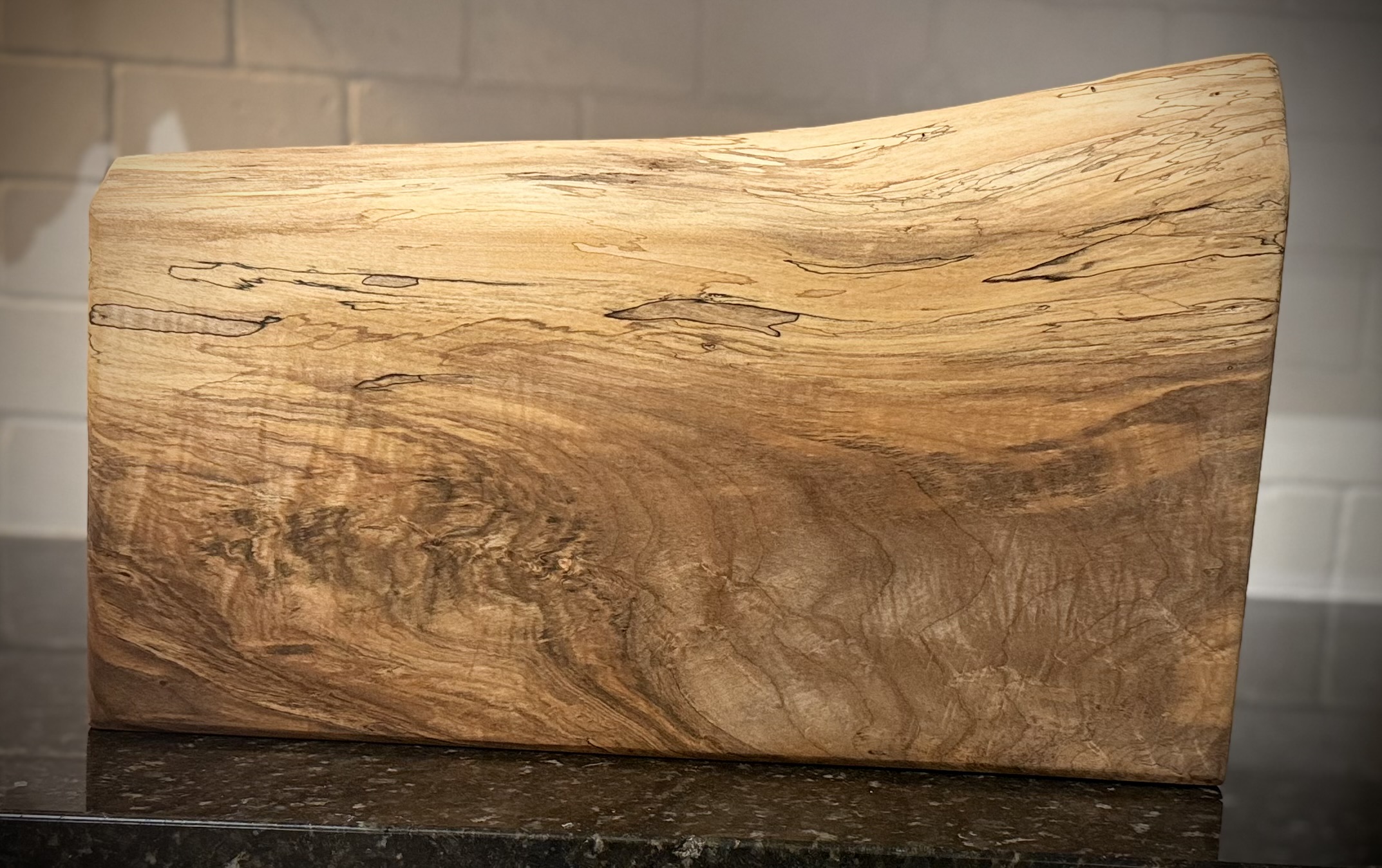 Spalted maple cutting and serving board with dramatic natural grain
